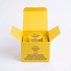 Yellow Peel skincare product packaging with a jar inside on a white background